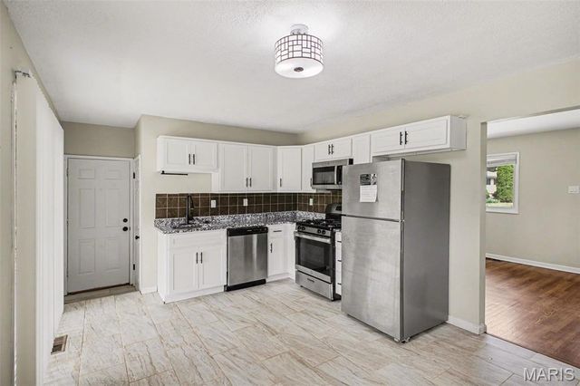 1180 Kostka Lane, Florissant, MO 63031