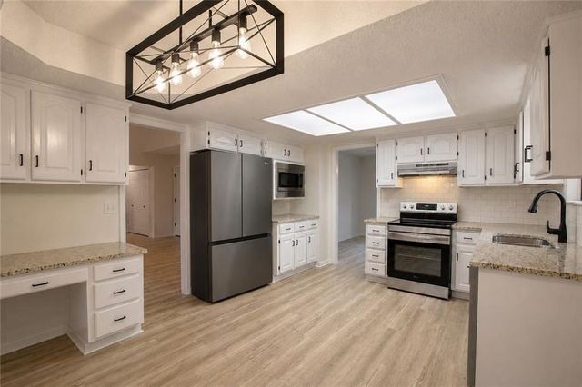 115 N PARK Drive, Raymore, MO 64083