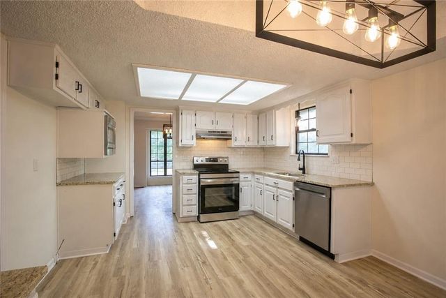 115 N PARK Drive, Raymore, MO 64083