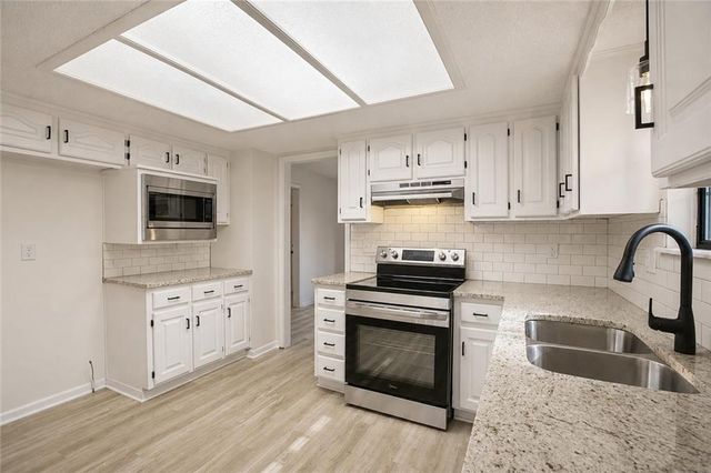 115 N PARK Drive, Raymore, MO 64083