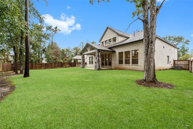 323 Calmato Woods Way, Conroe, TX 77318