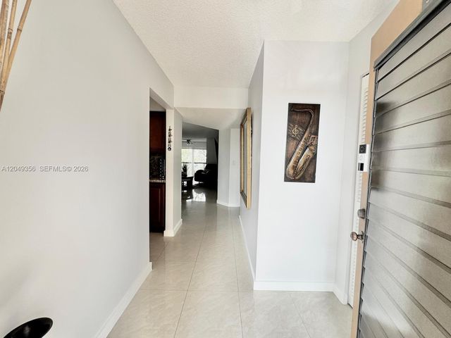 4975 E Sabal Palm Blvd 311, Tamarac, FL 33319
