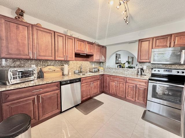 4975 E Sabal Palm Blvd 311, Tamarac, FL 33319