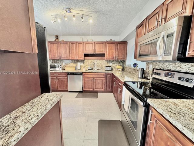 4975 E Sabal Palm Blvd 311, Tamarac, FL 33319