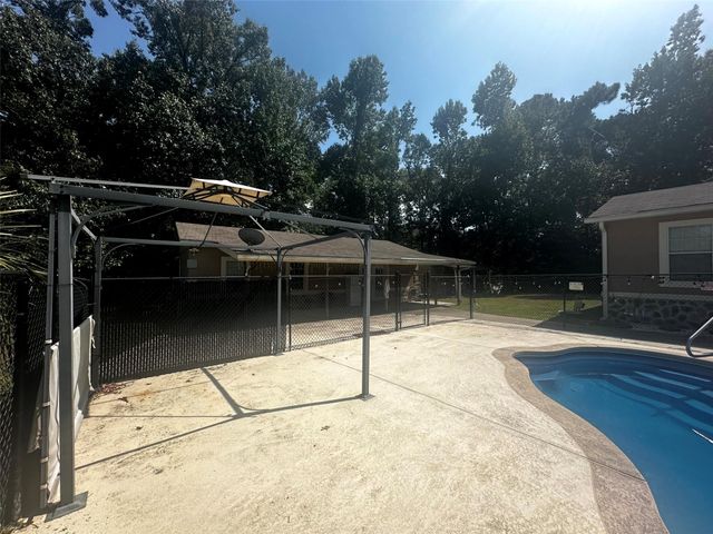 629 Hidden Oaks Drive, Point Blank, TX 77364