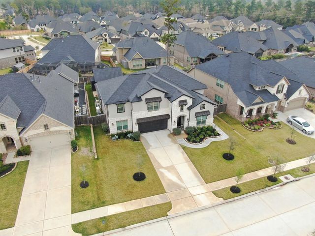 1067 Lakemont Bend Lane, Pinehurst, TX 77362