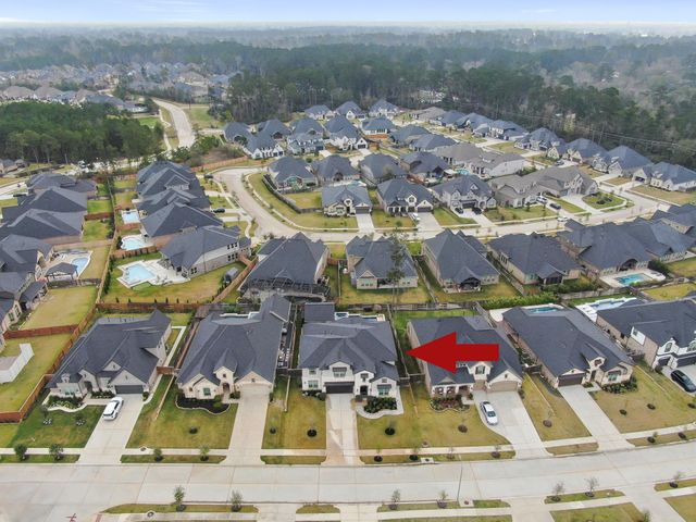 1067 Lakemont Bend Lane, Pinehurst, TX 77362