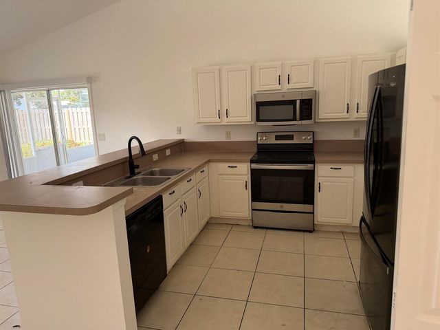 1874 SW Capehart Avenue, Port St. Lucie, FL 34953