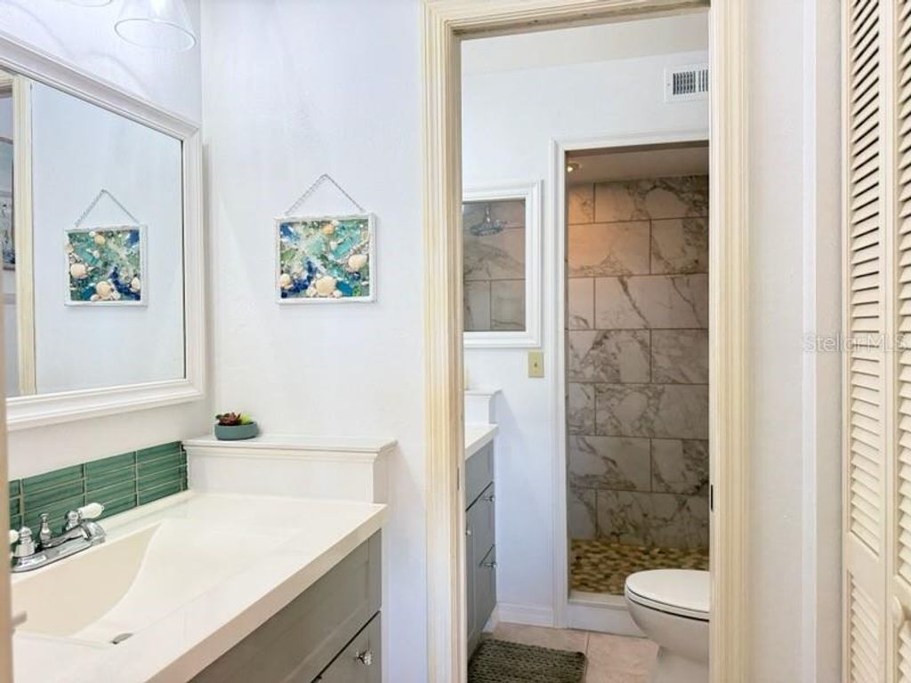 Image 22 of property listing at 460 BOUCHELLE DRIVE 104, New Smyrna Beach, FL 32169