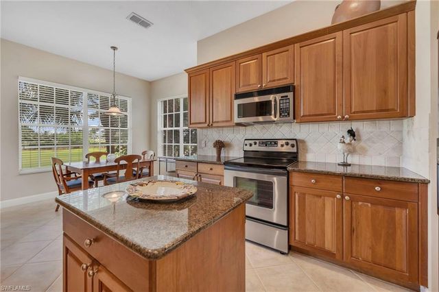 9029 Whimbrel Watch LN 202, Naples, FL 34109