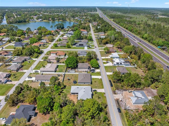 153 BIRD OF PARADISE DRIVE, Palm Coast, FL 32137