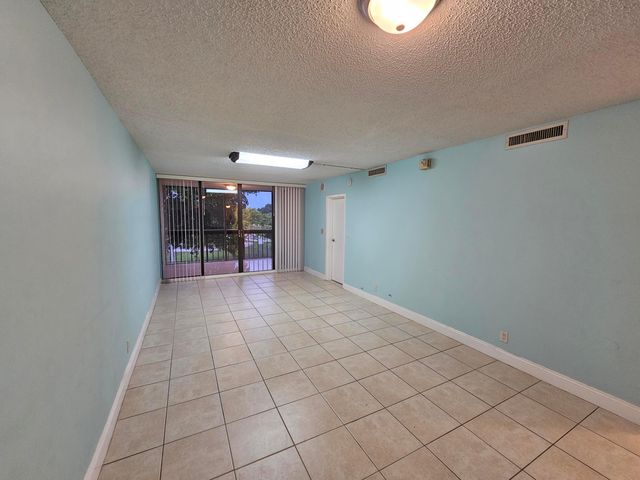 8441 Forest Hills Drive 302, Coral Springs, FL 33065