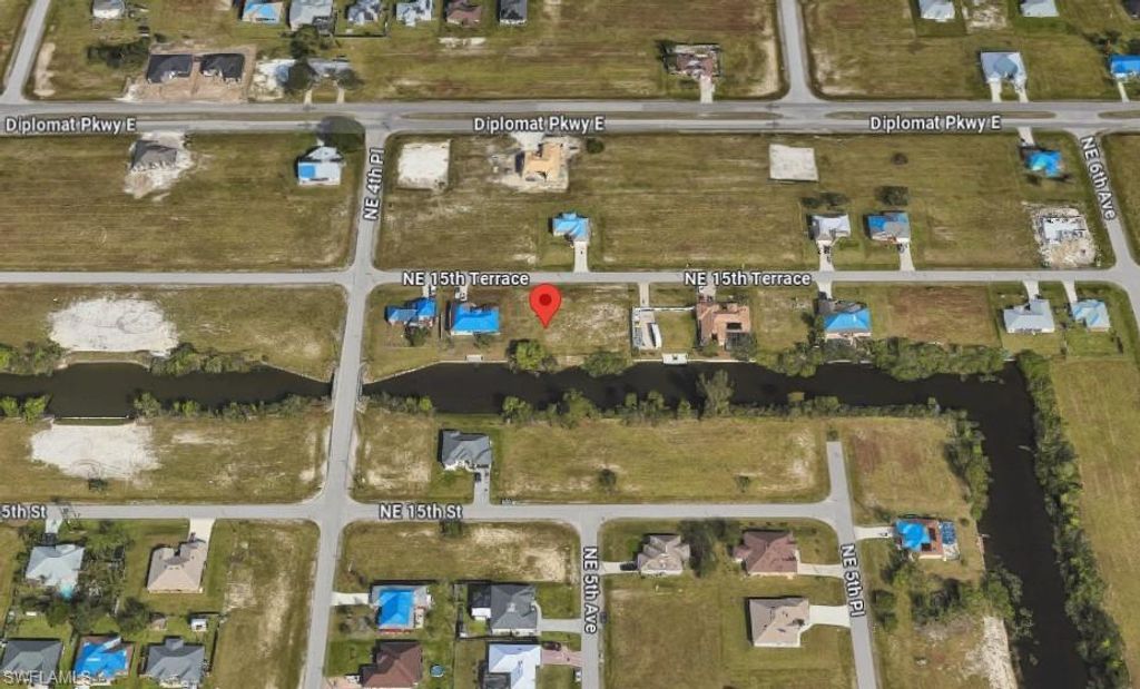424 NE 15th TER, CAPE CORAL, FL 33909 — exterior