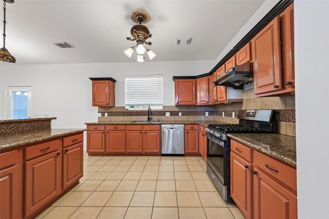 12214 Doe Meadow Drive, Stafford, TX 77477