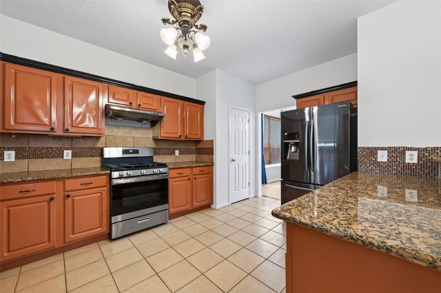 12214 Doe Meadow Drive, Stafford, TX 77477