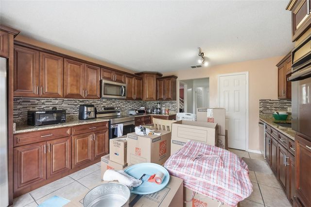 1172 EPSON OAKS WAY, Orlando, FL 32837