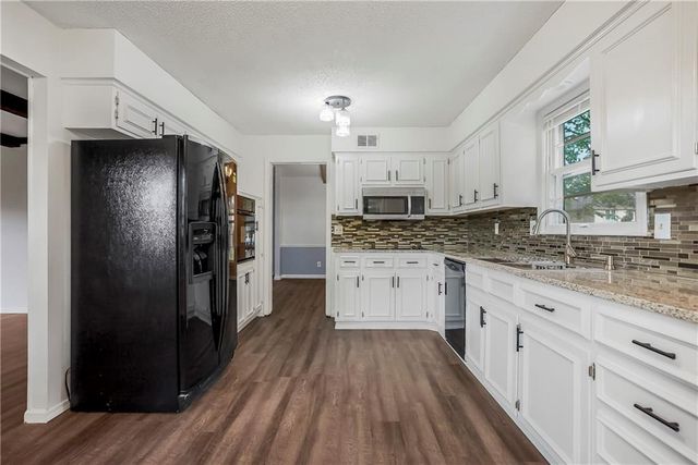 12629 Sycamore Avenue, Grandview, MO 64030