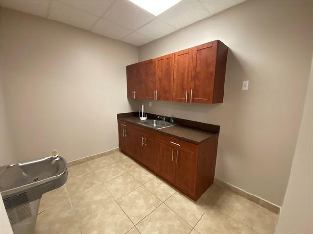 7551 Wiles Road 103, Coral Springs, FL 33067