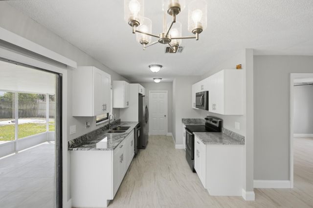 1781 SW Cloverleaf Street, Port St. Lucie, Port St Lucie, FL 34953