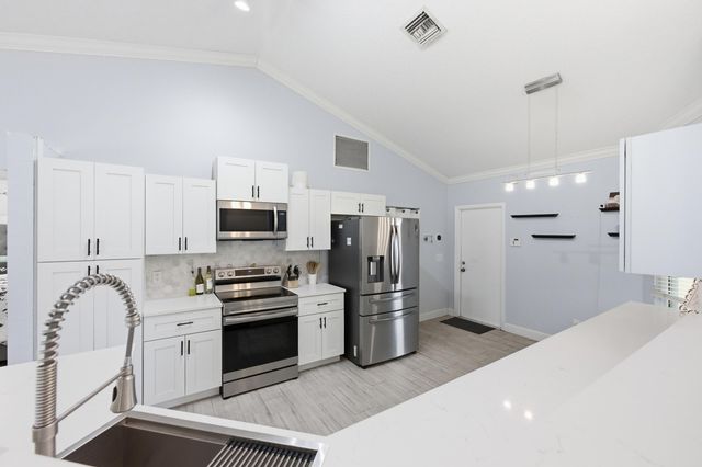 145 Roycourt Circle, Royal Palm Beach, FL 33411