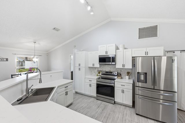 145 Roycourt Circle, Royal Palm Beach, FL 33411