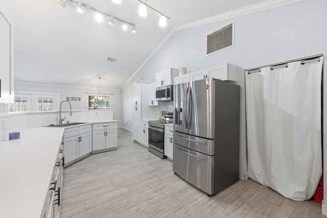 145 Roycourt Circle, Royal Palm Beach, FL 33411