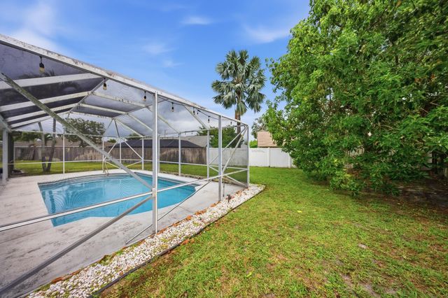 145 Roycourt Circle, Royal Palm Beach, FL 33411