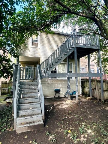 7047 S EBERHART Avenue, Chicago, IL 60637