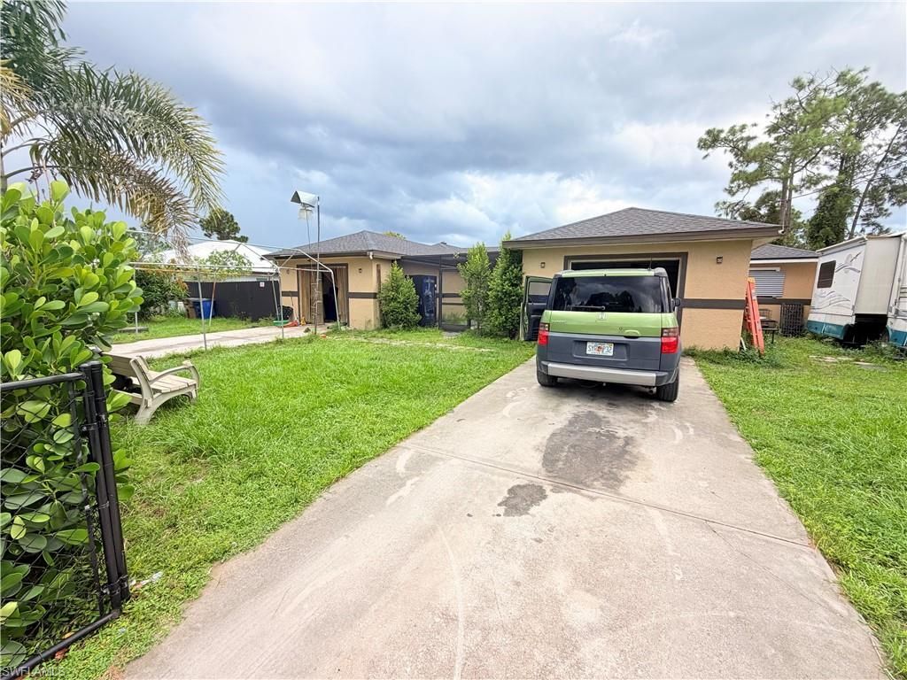 1024-1026 Ainsworth ST E, LEHIGH ACRES, FL 33974 — exterior