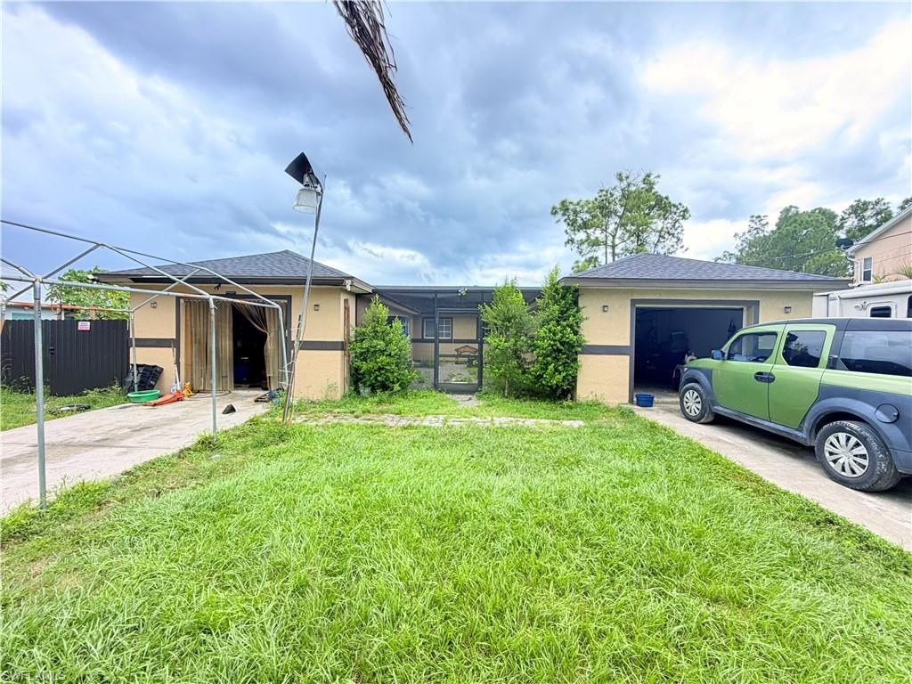 1024-1026 Ainsworth ST E, LEHIGH ACRES, FL 33974 — photo 2