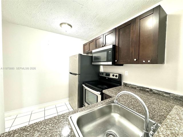 484 NW 165th St Rd A-411, Miami, FL 33169