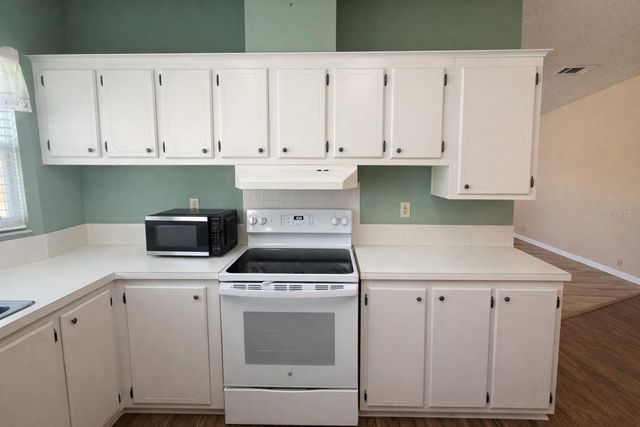 25308 CASA DEL LAGO LANE, Leesburg, FL 34748