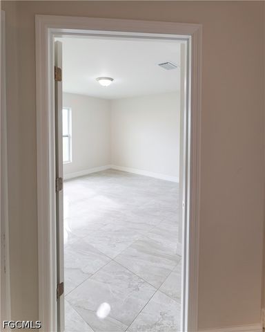 941 Jaguar BLVD, Lehigh Acres, FL 33974