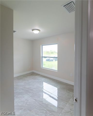 941 Jaguar BLVD, Lehigh Acres, FL 33974