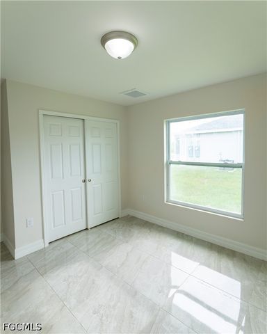 941 Jaguar BLVD, Lehigh Acres, FL 33974