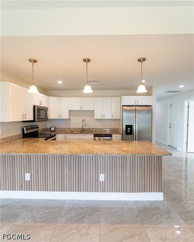 941 Jaguar BLVD, Lehigh Acres, FL 33974