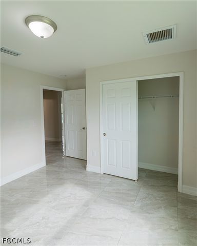 941 Jaguar BLVD, Lehigh Acres, FL 33974