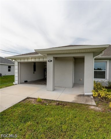 941 Jaguar BLVD, Lehigh Acres, FL 33974