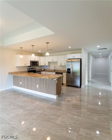 941 Jaguar BLVD, Lehigh Acres, FL 33974
