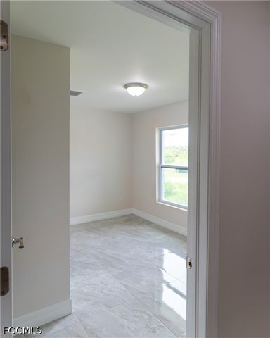 941 Jaguar BLVD, Lehigh Acres, FL 33974