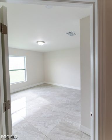 941 Jaguar BLVD, Lehigh Acres, FL 33974
