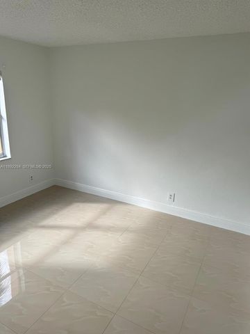 18101 NW 68th Avenue D207, Hialeah, FL 33015