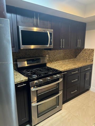 18101 NW 68th Avenue D207, Hialeah, FL 33015