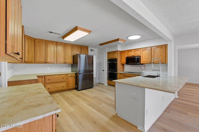 9875 W MAGNOLIA Court, Sun City, AZ 85373