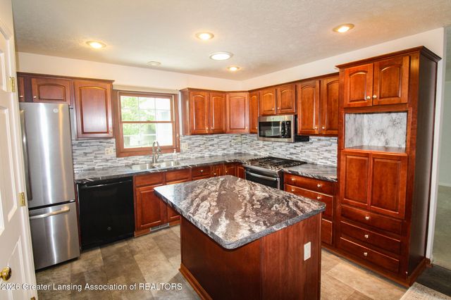 1036 N Crandell Drive, Charlotte, MI 48813