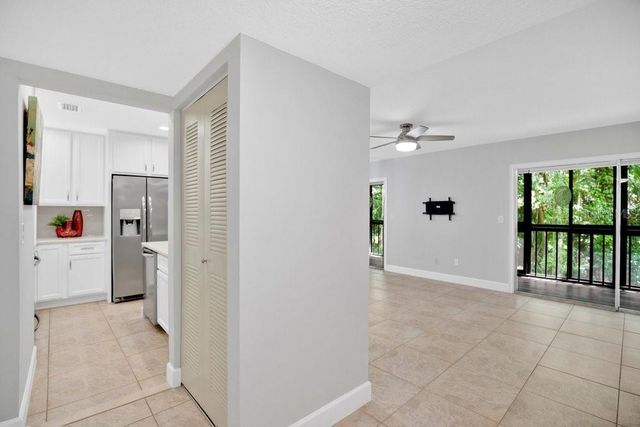 150 WAX MYRTLE WOODS COURT 9B, Deltona, FL 32725