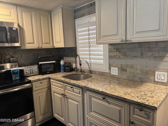 67 GOLDEN GATE Circle N, Port Orange, FL 32129