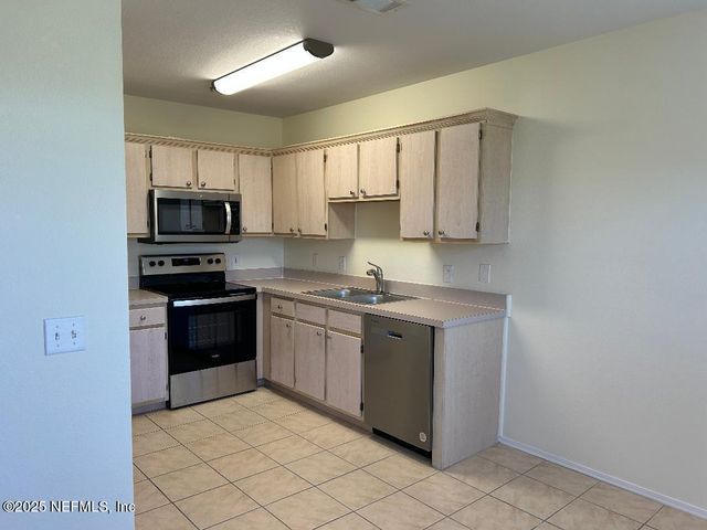 1701 THE GREENS Way, 1431, Jacksonville Beach, FL 32250