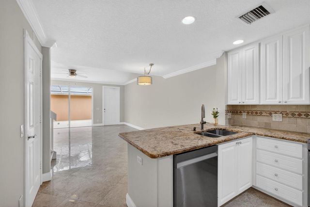 219 Soriano Drive, Jupiter, FL 33458