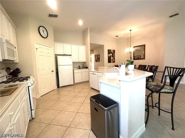 1634 Tarpon Bay DR S 202, Naples, FL 34119